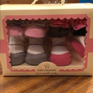 New in box - 4 pairs of socks.